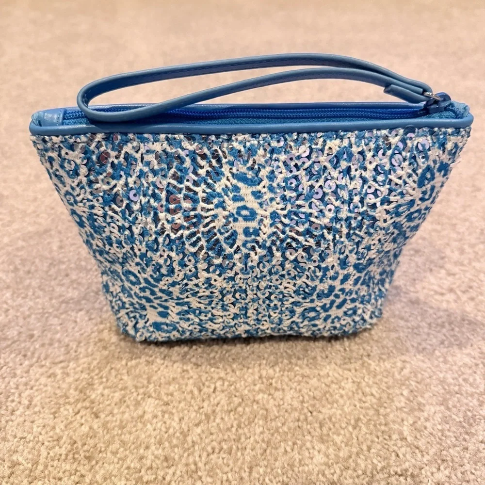 Vera Bradley mesh sequin wristlet on the Camocat blue pattern